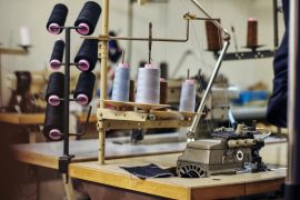close-up-image-lot-coils-with-threads-sewing-workshop_613910-4427