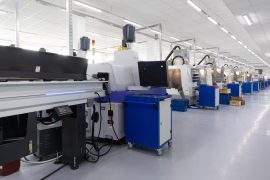 close-up-shot-screw-cutting-machine-factory-that-makes-metal-details_645730-81