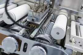metal-chromed-manufacture-machines-with-shafts-wires-electronics-close-turned_645730-391