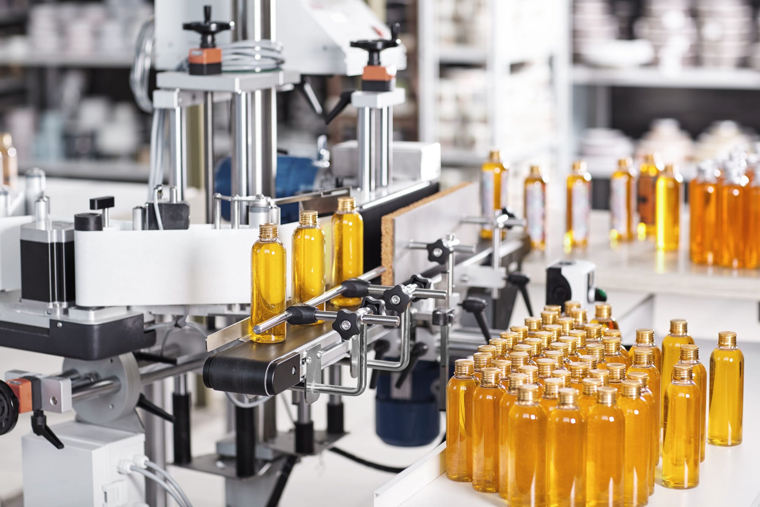 transparent-plastic-bottles-filled-with-yellow-substance (1)